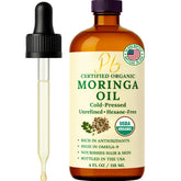 Pomberries Moringa Oil bottle in amber glass for skin hydration