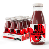 Pomona Pure Pomegranate Juice bottle pour showcasing 100 organic juice