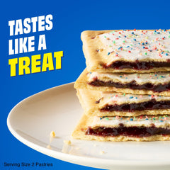 Frosting with colorful sprinkles on blueberry pastry for a fun treat.
