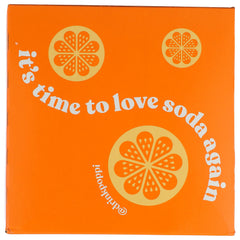 Poppi Orange can in hand for a quick, portable pick-me-up.