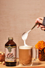 Latte with hazelnut swirls created by Portland Syrups Hazelnut Syrup