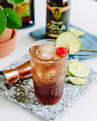 True Cola mixed with sparkling water for a refreshing mocktail