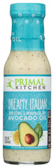 Primal Kitchen Dreamy Italian dressing bottle pour enhances salads with bright, zesty flavor.
