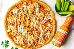 Close-up of ingredients in Avocado oil-based Buffalo Sauce.