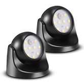 ProGreen 6000K battery motion sensor light on an outdoor wall for auto-on safety lighting.