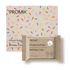 Promix Nutrition Protein Puff Bars Birthday Cake box on a clean surface; gluten-free, high-protein snack.