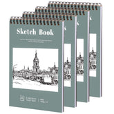 Prudiut 4 pack small sketch books on a table for portable drawing sessions