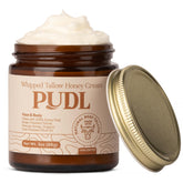 PUDL grass-fed beef tallow honey cream jar showing rich, nourishing texture for skin.