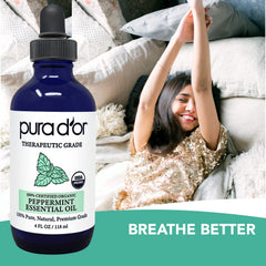 Close-up of the dropper with PURA D'OR peppermint oil for precise use
