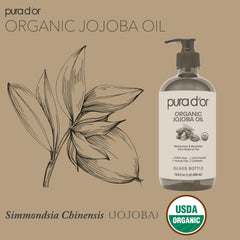 PURA D'OR Jojoba Oil in amber glass bottle enhances skincare and self-care routines.