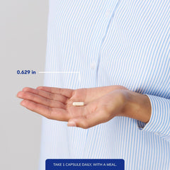 Pure Encapsulations DHEA bottle beside a glass of water for daily wellness.