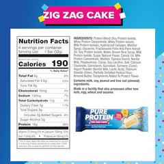 Close-up of Pure Protein Zig Zag Cake Bar with fudge drizzle and vanilla core.