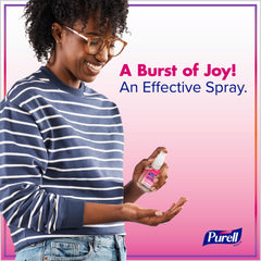 PURELL Hand Sanitizer Spray Tangerine-Pear bottle with citrus aroma for on-the-go cleanliness.