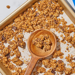 Purely Elizabeth Cookie Granola Chocolate Chip with milk, a perfect pairing for breakfast.
