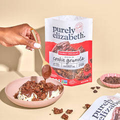 Serving bowl with Purely Elizabeth Double Chocolate granola and milk for dunking.