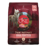 Purina ONE True Instinct beef-salmon kibble in a bowl supports muscle strength