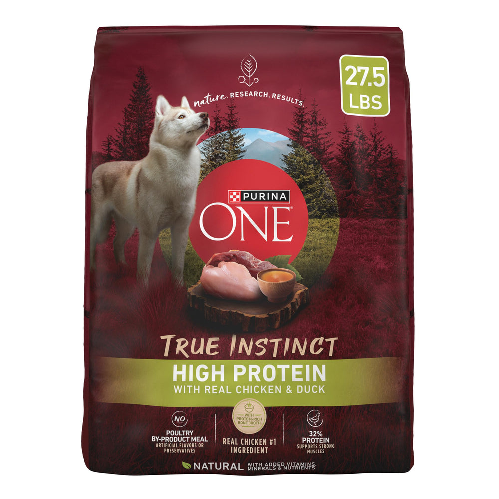 Purina ONE True Instinct kibble in bowl showing real chicken and duck for protein.