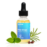 Puur Smile Floss Drop Serum bottle boosts fresh breath during daily care.