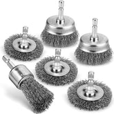 Pylevemv wire cup brush removing rust from metal surfaces for restoration.