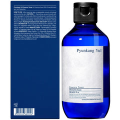Close-up of Pyunkang Yul PKY Essence Toner pump showing smooth texture
