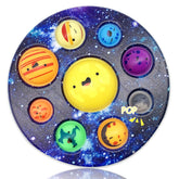 QETRABONE eight-planet cave bubble toy closeup showing vibrant planets for tactile focus