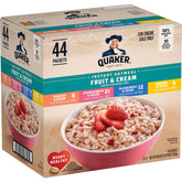Quaker Instant Oatmeal Fruit & Cream variety pack on the counter for quick mornings.