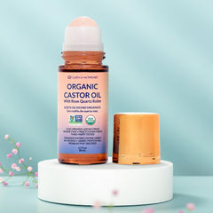 QUEEN OF THE THRONES Rose quartz roller close-up highlights soothing application