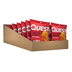 Quest Spicy Cheddar Crackers on desk provide quick protein between tasks