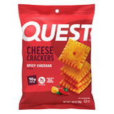 Quest Spicy Cheddar Cheese Crackers pack on shelf offering a protein-rich snack