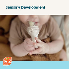 RaZbaby baby-held feeder highlighting ergonomic handle for little hands.