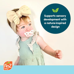 RaZbaby RaZberry teether hands-free design for on-the-go soothing.