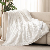 Reaks electric heated throw blanket in front view delivering cozy warmth for chilly evenings.