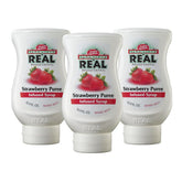 Reàl Infused Exotics Strawberry Syrup bottle front view for versatile drinks