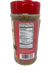 Pouring Red Robin Signature Seasoning to enhance seafood flavor and aroma.