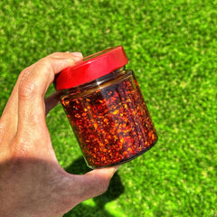 Pouring Redbloom over a bowl adds savory heat and texture
