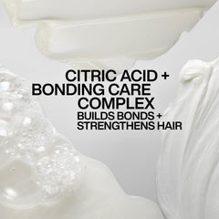 Redken Acidic Bonding Concentrate liquid mask texture close-up shows smoothness.