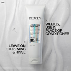 Redken Acidic Bonding Concentrate applied to wet hair evenly.