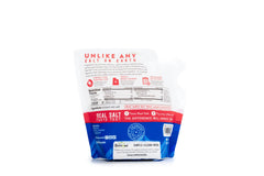 Redmond Real Salt unrefined mineral crystal texture highlights natural flavor in cooking.