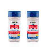 REDMOND Real Sea Salt bottle shaker with fine grains for versatile seasoning.