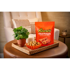 Snack bowl filled with Reese's Pretzels, ideal party bite appeal.