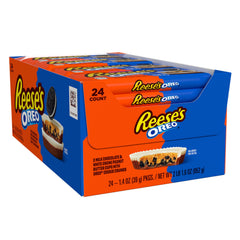 Cross-section reveals Oreo crumbs inside a Reese's Oreo cup.