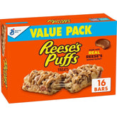 REESE'S Puffs Treat Bars box featuring peanut butter and cocoa flavor for family snacking.