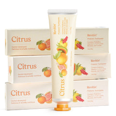Revitin citrus toothpaste tube shows fluoride-free formula for fresh breath
