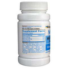 Rising Mag64 bottle label closeup shows calcium and magnesium formula for heart and muscle support