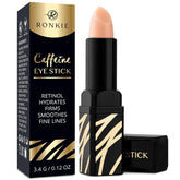 RONKIE Caffeine Eye-Stick applying brightening formula to the eye area for a refreshed look.
