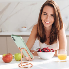 ROPOSY cell phone stand doubles as a compact desk accessory.