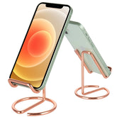 ROPOSY cell phone stand in rose-gold metal finish for an elegant desk.