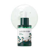 ROUND LAB Pine Calming Cica Ampoule bottle close-up for soothing hydration.