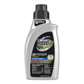 Roundup Dual Action 365 bottle shown for long-lasting weed control on a driveway.