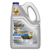 Roundup Dual Action Weed Killer bottle pouring on crack-filled driveway to target weeds.
